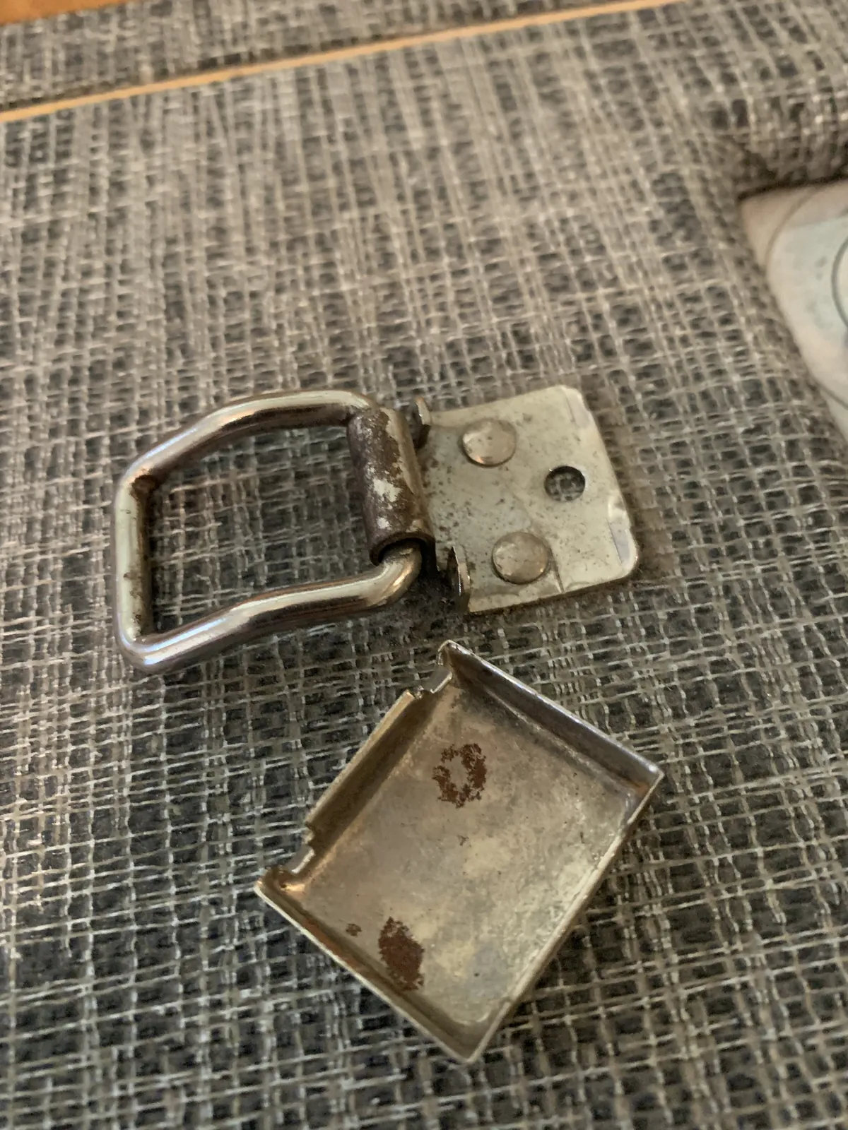 Old handle hardware: a metal loop and bracket